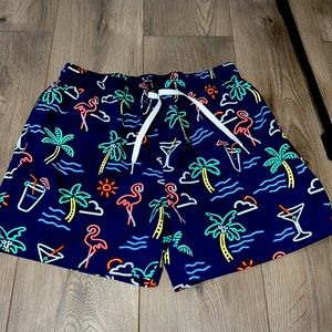 Chubbies swim trunks with art deco neon detail